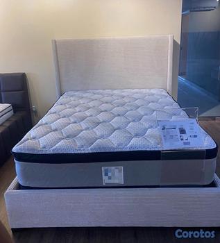 muebles y colchones - vendo base con espaldar de 54 su color es cremita  un año de gatantia. 