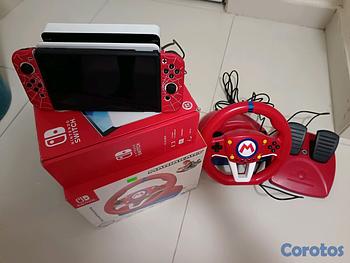 consolas y videojuegos - Nintendo switch oled + guía Mario kart
